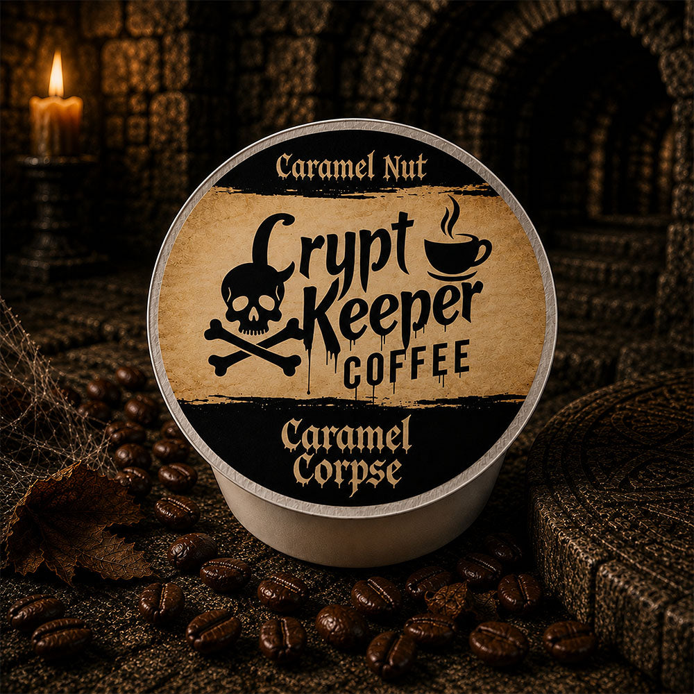 A single round coffee pod package labeled 'Crypt Keeper Coffee' and 'Caramel Nut' sits on a dark textured surface surrounded by coffee beans, with a candle and stone archway in the background.